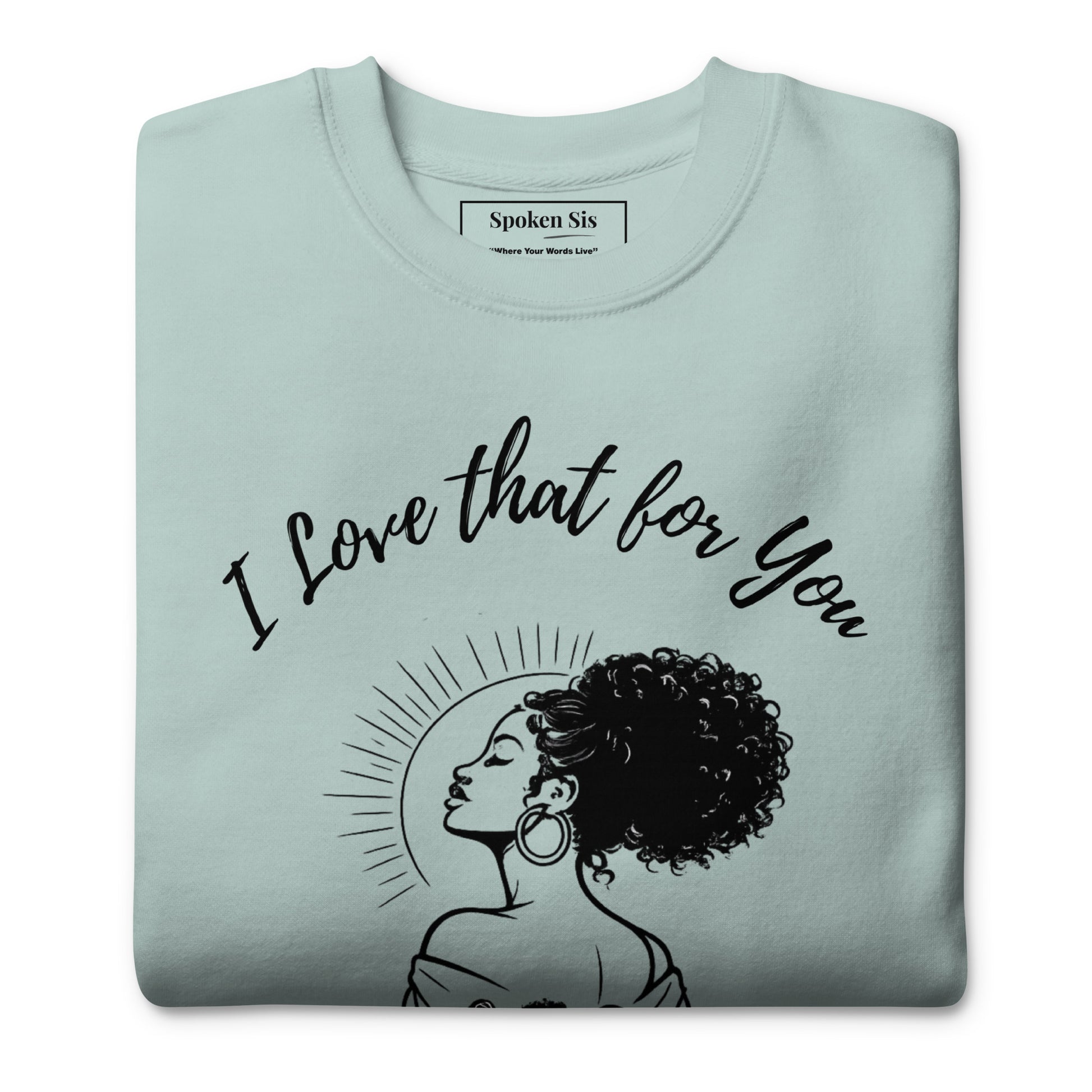 light blue folded sweatshirt with a phrase on front