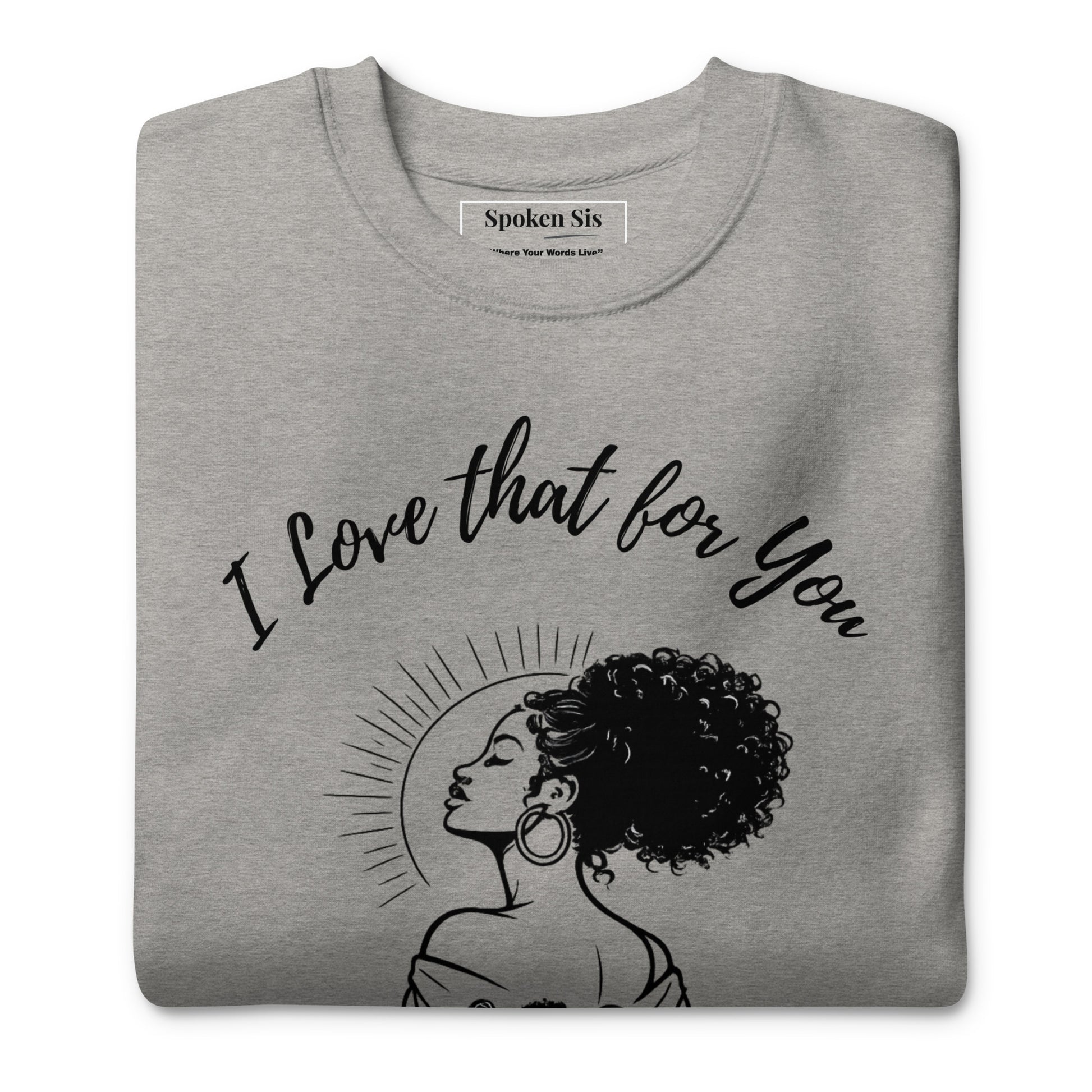 gray folded sweatshirt with a phrase on front.
