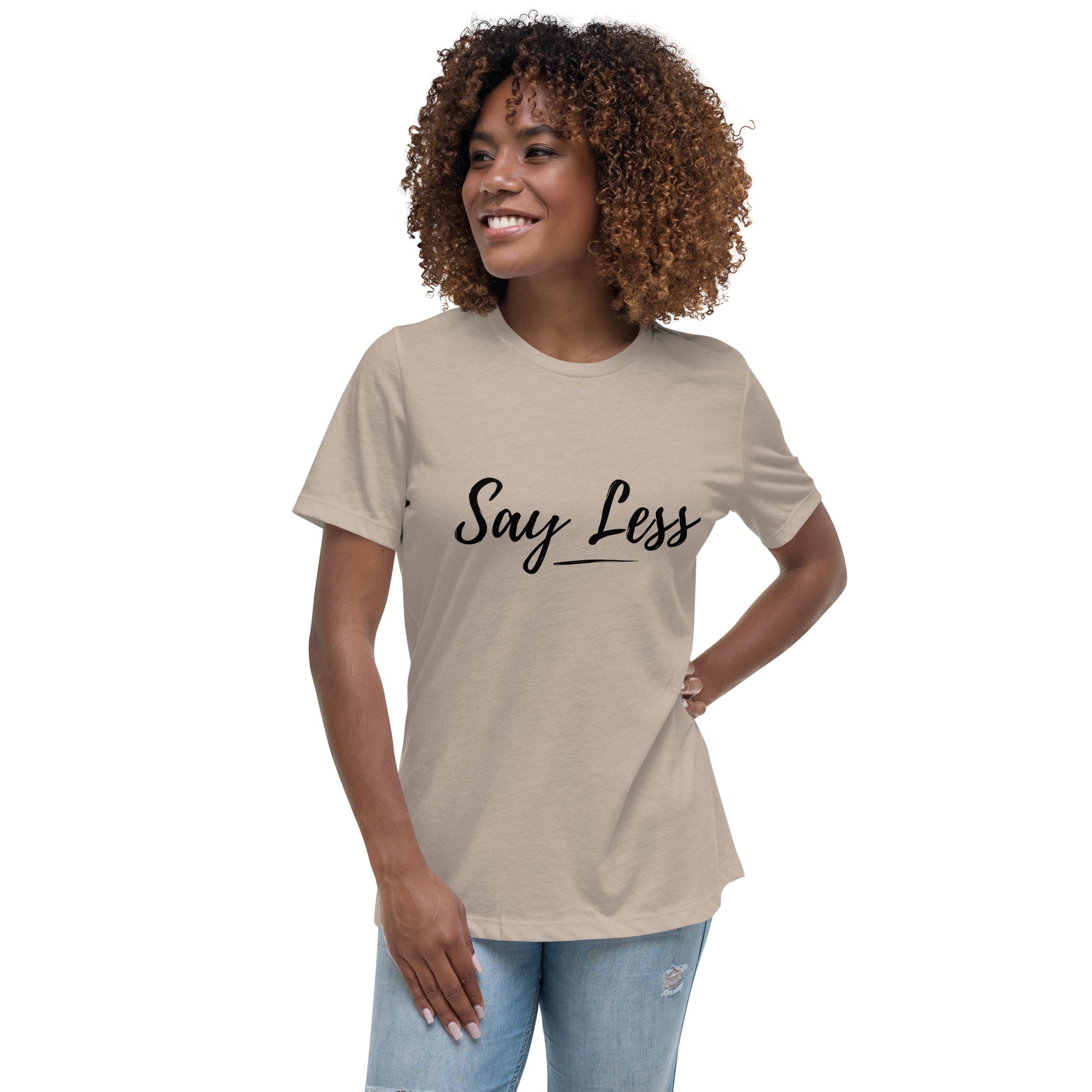 Model wearing a beige t-shirt with 'Say Less' text on a white background